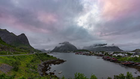 panoramic time lapse of moody clouds over fishing village reine, lofoten, norway