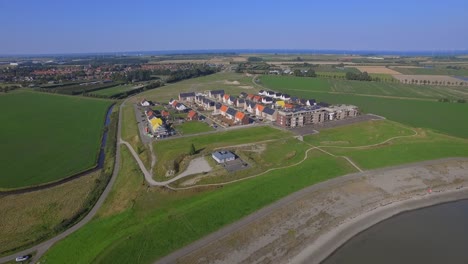 Aerial-shots-of-a-new-neighborhood-near-the-sea-in-Kruiningen,-the-Netherlands