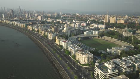 Drone-flyover-the-Brabourne-Stadium-by-the-Marine-Drive-in-Mumbai-City,-India