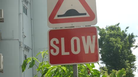 slow sign on street in singapore