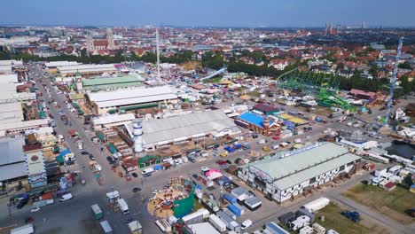 Lovely-aerial-top-view-flight-Theresienwiese-october-festival,-sunny-day-before-opening