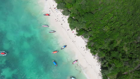 Birds-view-of-white-sandy-beach-and-turquoise-ocean-in-zanzibar-at-sunny-day