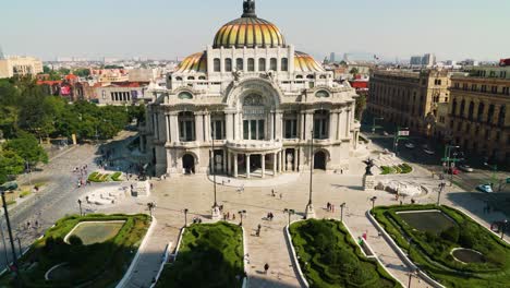 Pan-Tilt-Up-Reveals-Palacio-de-Bellas-Artes-in-Mexico-City-on-Clear-Day,-CDMX