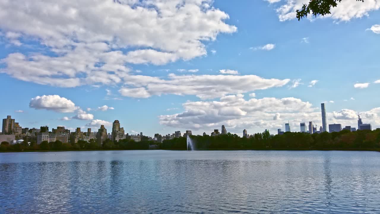 Central park lake with a fountain in New York