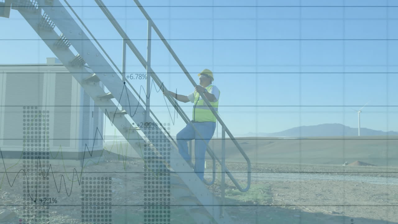 Worker in safety gear climbing stairs, financial data animation over industrial site