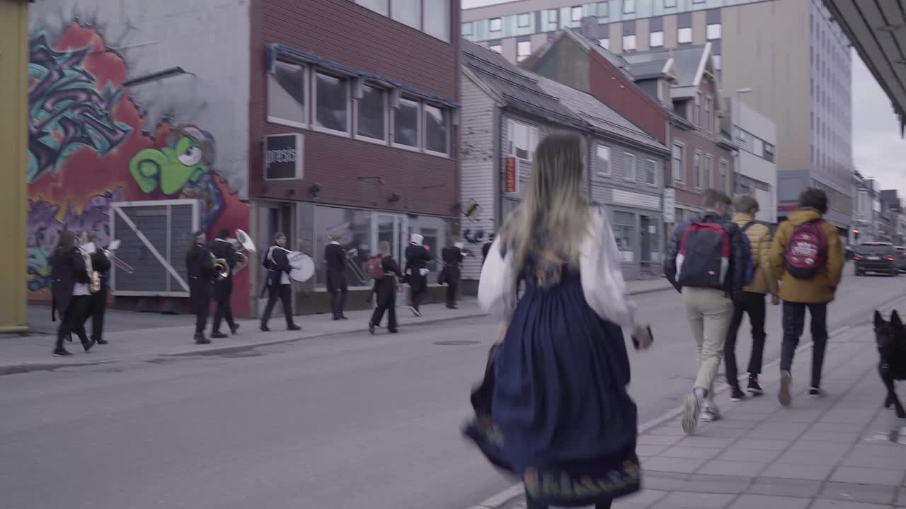 Musical Band Parade In The Street In Tromso, Norway. Norwegian Constitution Day. wide shot