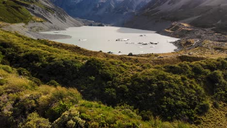 aerial view of hooker lake, tilt up to mt cook