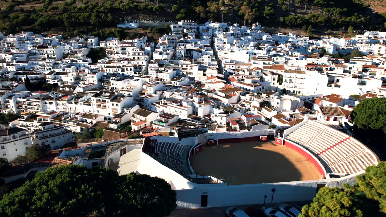 Beautiful classic spanish architecture winding neighborhood by mountains Mijas Pueblo Spain