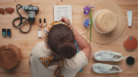 woman getting ready for summer trip