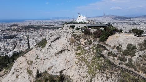 4k aerial drone view of athens in greece on a sunny day moving forward