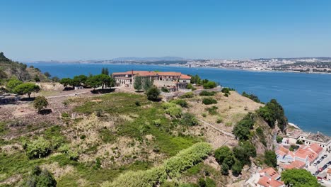 drone footage of a spooky abandoned building by porto brandao, south of lisbon