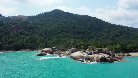 tropical sandy beach rocky coast koh phangan