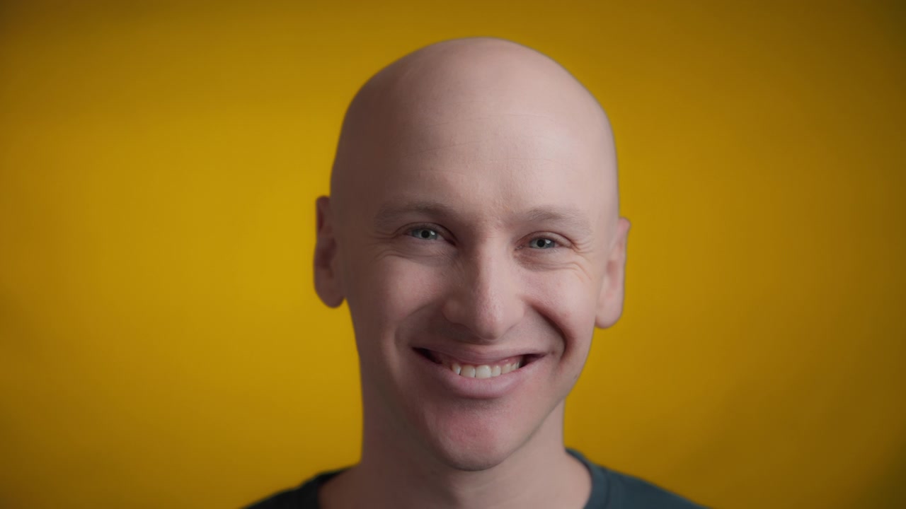 Male smiling at the camera