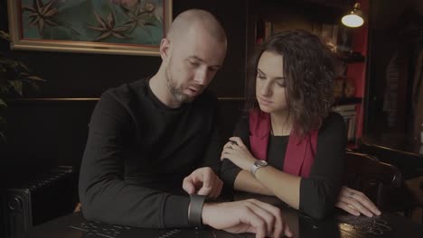 couple in conversation at a cafe