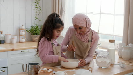 mother and daughter baking together