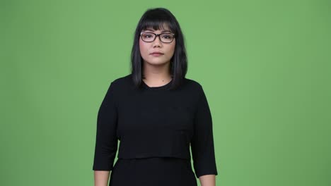 beautiful asian businesswoman giving handshake