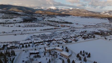 Aerial-Tilting-Shot-of-Sunrise-in-the-Rocky-Mountains