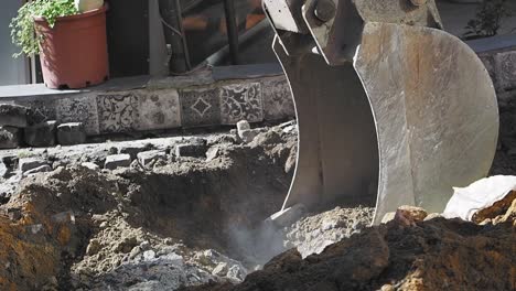 excavator digging a hole