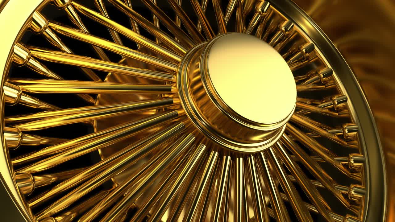 Primo piano in loop di una ruota a raggi tripla dorata con pneumatico