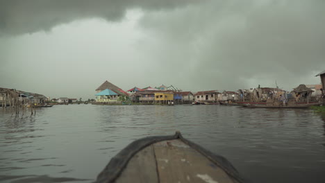 pov from a canoe on the lake nokoue near ganvie lake