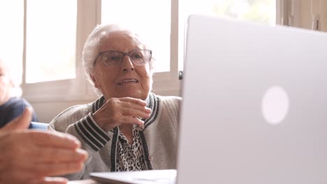Senior couple sending air kiss during video call