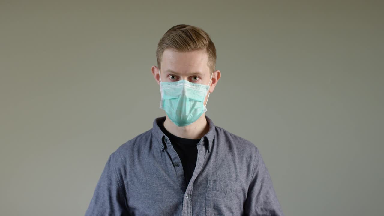 European Man Putting On Face Mask B