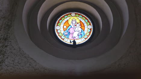 Colorful-window-in-an-ancient-stone-church-in-Budapest