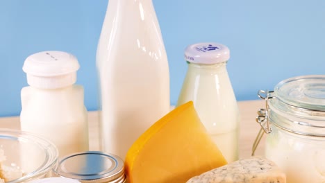 assorted dairy items displayed against a blue backdrop