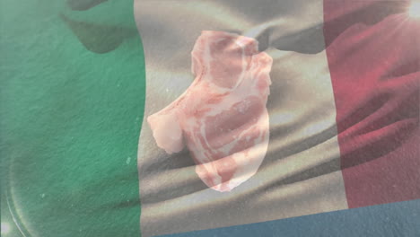 raw pork chop with italian flag overlay on textured surface