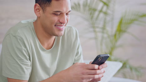 happy, smile and relax man with phone in house