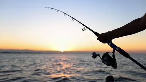 fishing at sunset