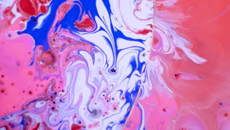 movimiento abstracto de pinturas acrílicas. vista desde arriba. increíbles patrones de mezcla de colores