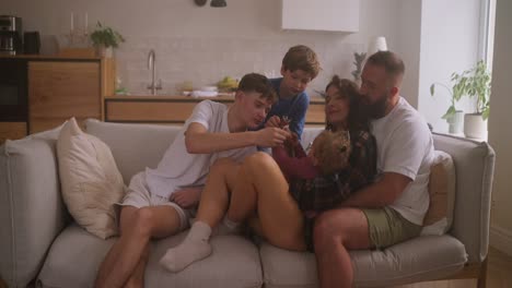 family enjoying time together on the couch