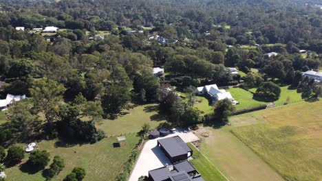 aerial view of large countryside private properties in australia with swimming pools and solar panels