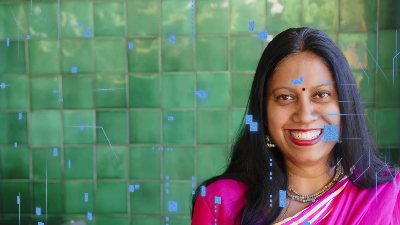 Mature woman turning toward camera as blue graphics appear, engaging viewer for marketing on tiles