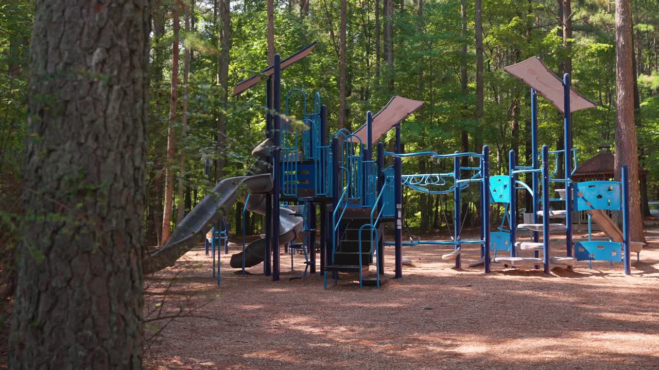 Camera Truck Right Revealing Playground in Park
