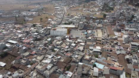 Aerial-orbits-Mayan-Church-in-center-of-San-Andres-Xecul-in-Guatemala