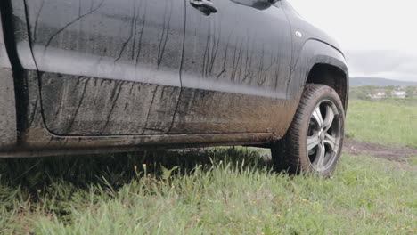 dirty pickup truck parked in field in slow motion