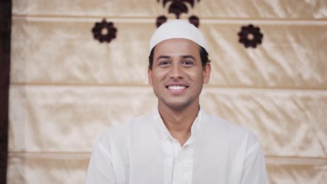 Happy-Indian-muslim-man-smiling-towards-the-camera