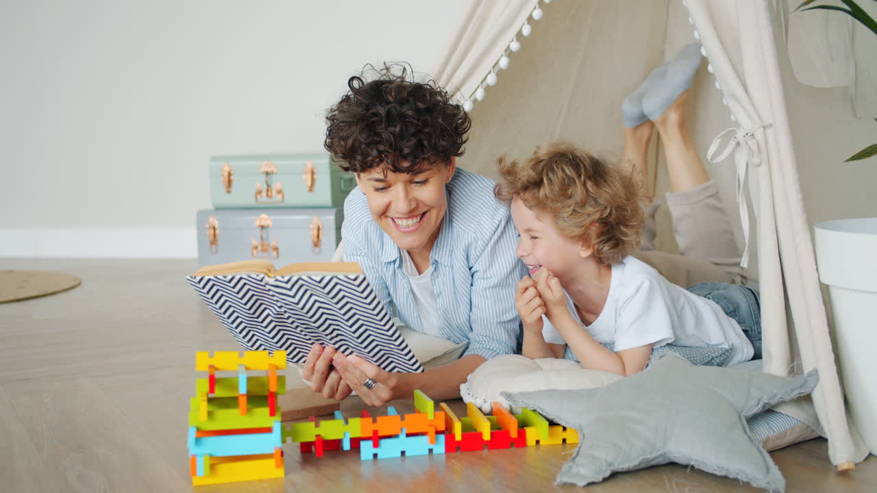 Mother and Child Reading and Playing Together