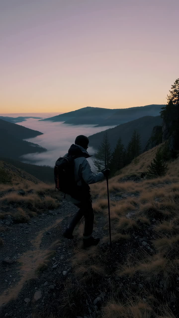 Hiker in Mountains at Sunrise