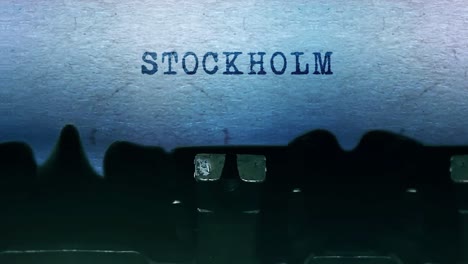 stockholm word closeup being typing and centered on a sheet of paper on old vintage typewriter