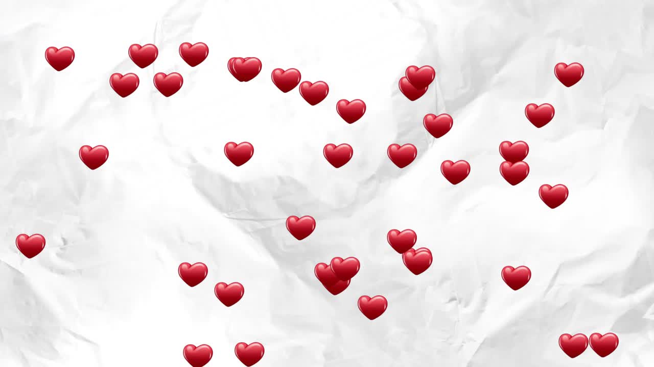 A partire da due icone a forma di cuore rosso in basso al centro, cuori che si generano e fluttuano verso l'alto su carta sgualcita