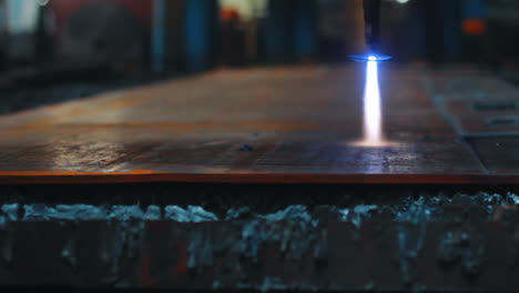 high precision cnc plasma cutting machine during operation on metal sheet