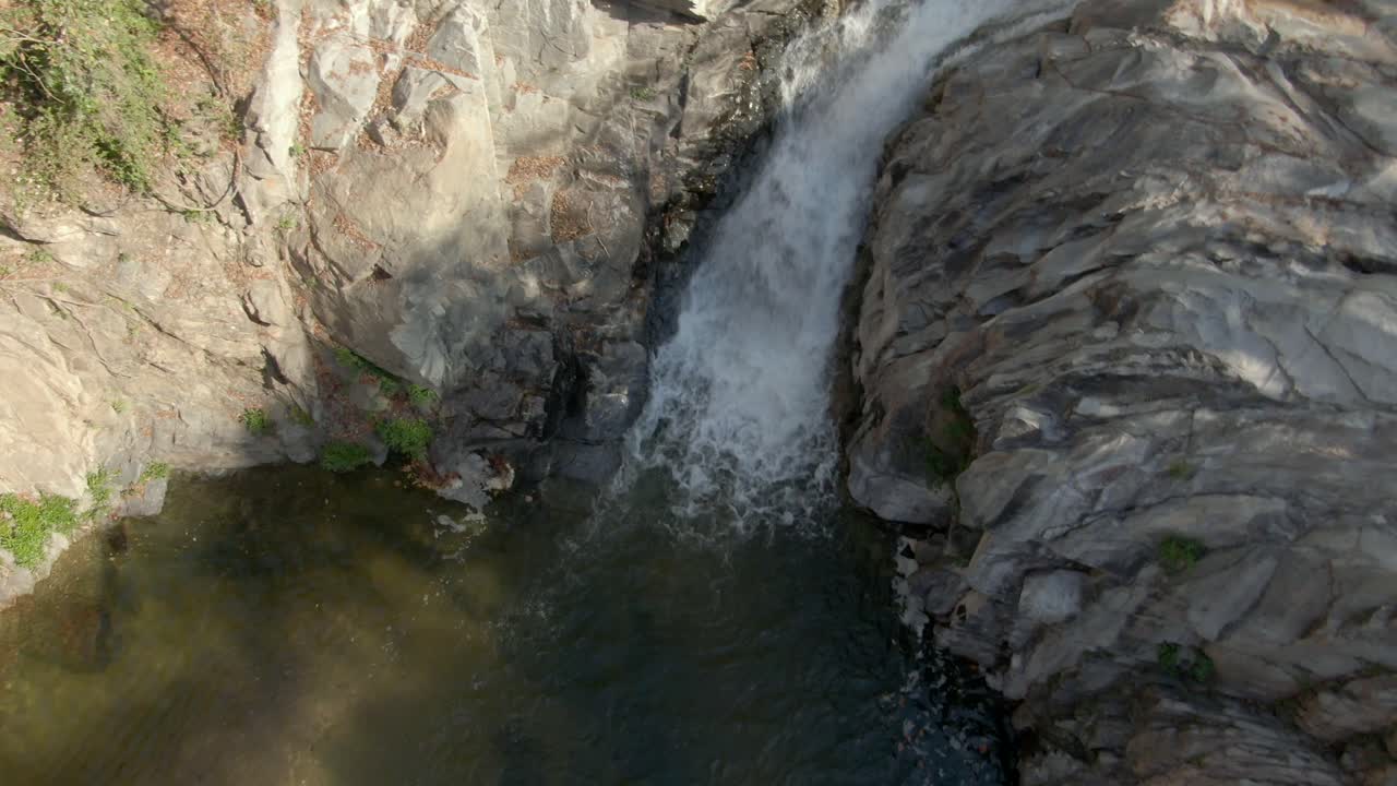 Drone Circles Above Yelapa Waterfall With The Rocky Mountains Near Cabo Corrientes, Jalisco In Mexico. Aerial Shot