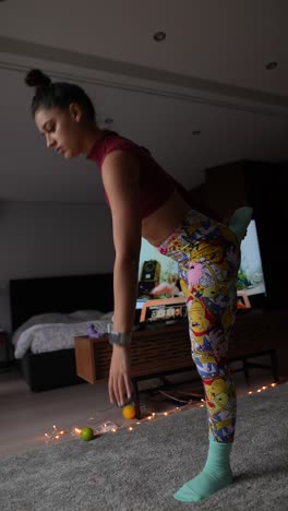 woman doing a yoga pose at home