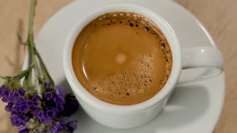 espresso with purple flowers
