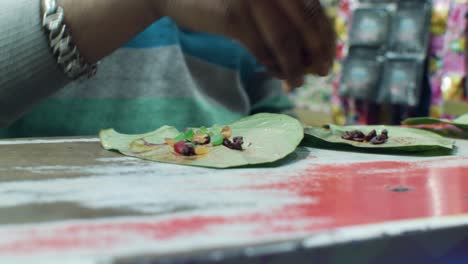 indian man preparing banarasi paan in jodhpur