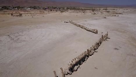 abandoned dock in desert wasteland - bombay beach- salton sea, california