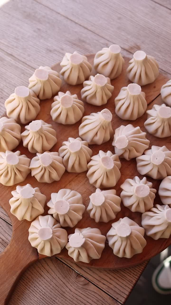 Preparing Khinkali - Georgian Dumplings